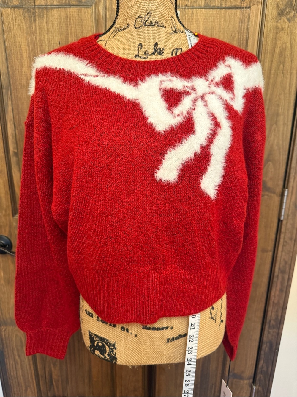 Red Crewneck Sweater with White Fuzzy Bow Detail